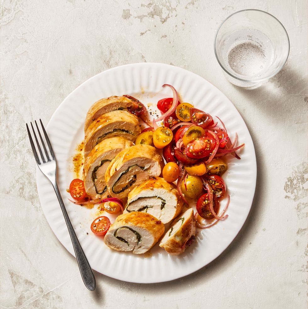 https://hips.hearstapps.com/hmg-prod/images/chicken-roulades-with-marinated-tomatoes-1606159468.jpg