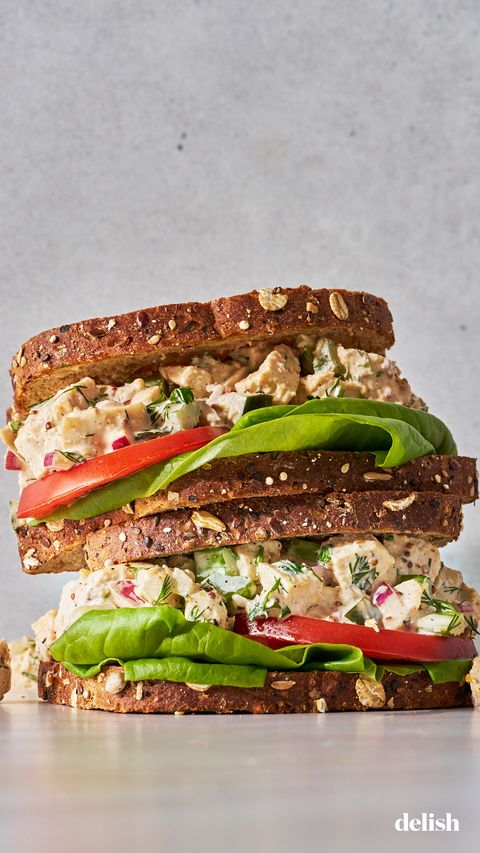 poached chopped chicken tossed with onion, dill, celery, mayo, and greek yogurt with lettuce and tomato on whole grain bread
