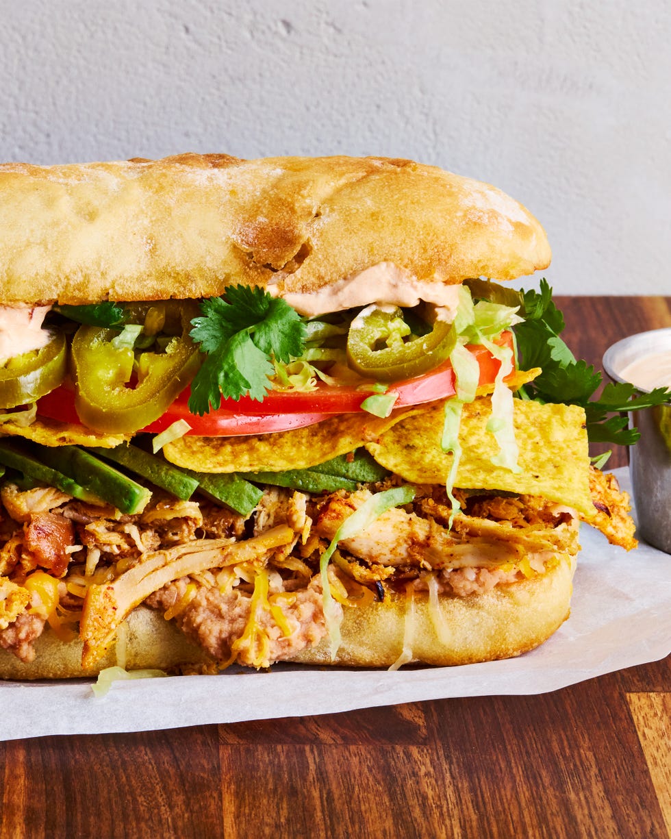 shredded chicken, veggies, and tortilla chips between two slices of bread