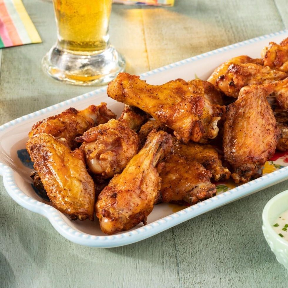 https://hips.hearstapps.com/hmg-prod/images/chicken-wing-recipes-air-fryer-chicken-wings-1675985036.jpeg?crop=0.9953358208955224xw:1xh;center,top&resize=980:*