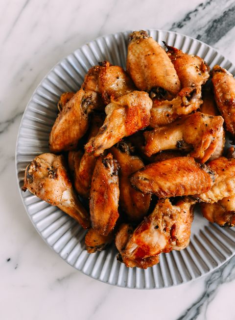 oyster sauce baked chicken wings on gray plate
