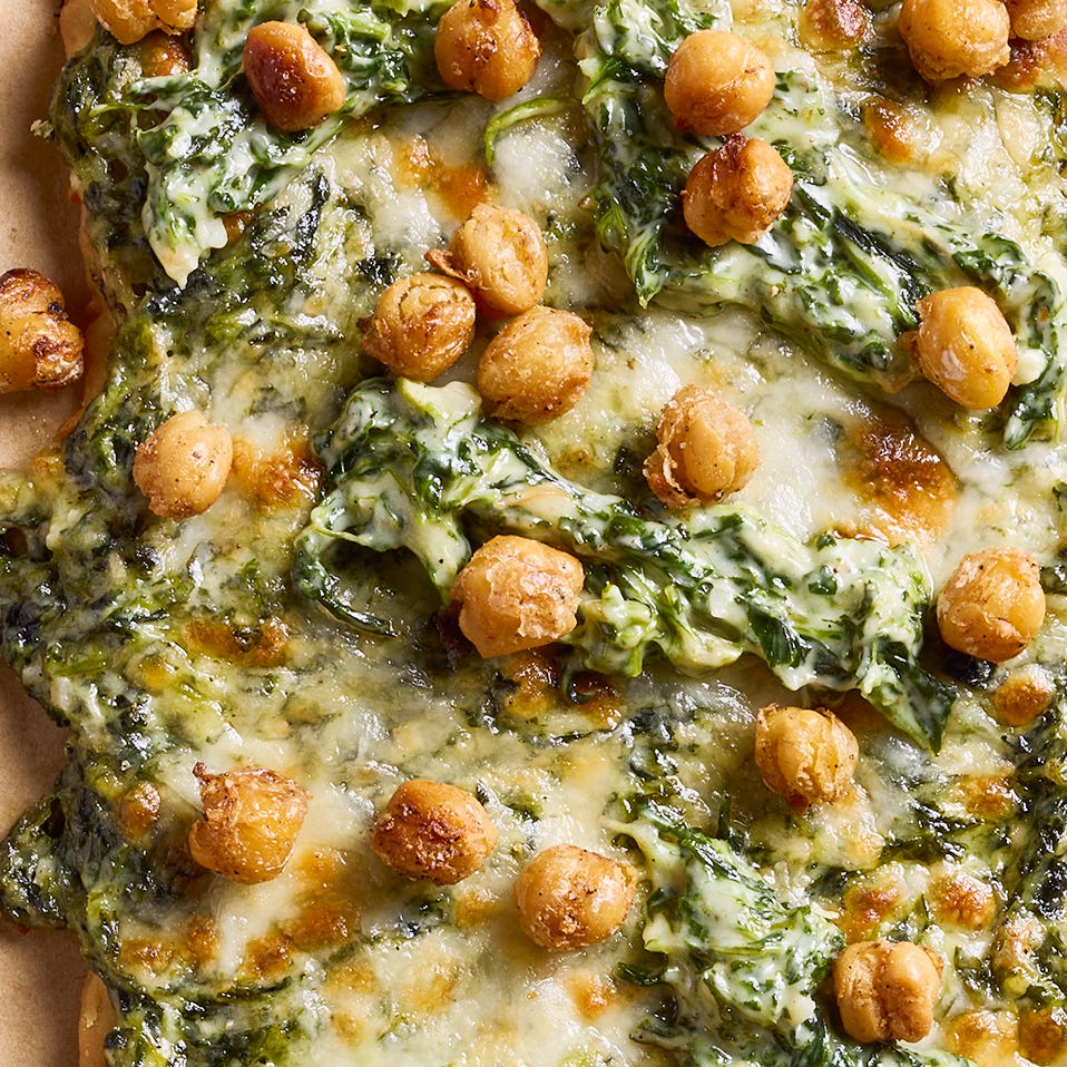 chickpea florentine flatbread with cream, spinach, and parmesan