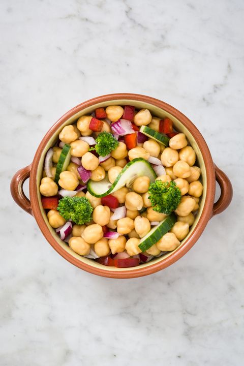 a bowl of chickpea and veggies on a marble counter, a good housekeeping pick for a healthy weight loss food