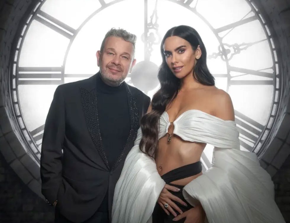 a man and woman posing for a picture