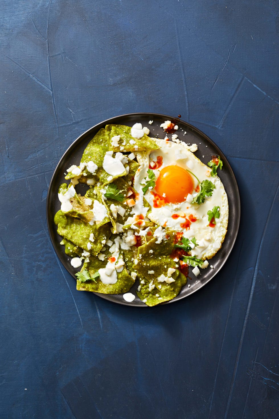 chilaquiles verdes with a fried egg