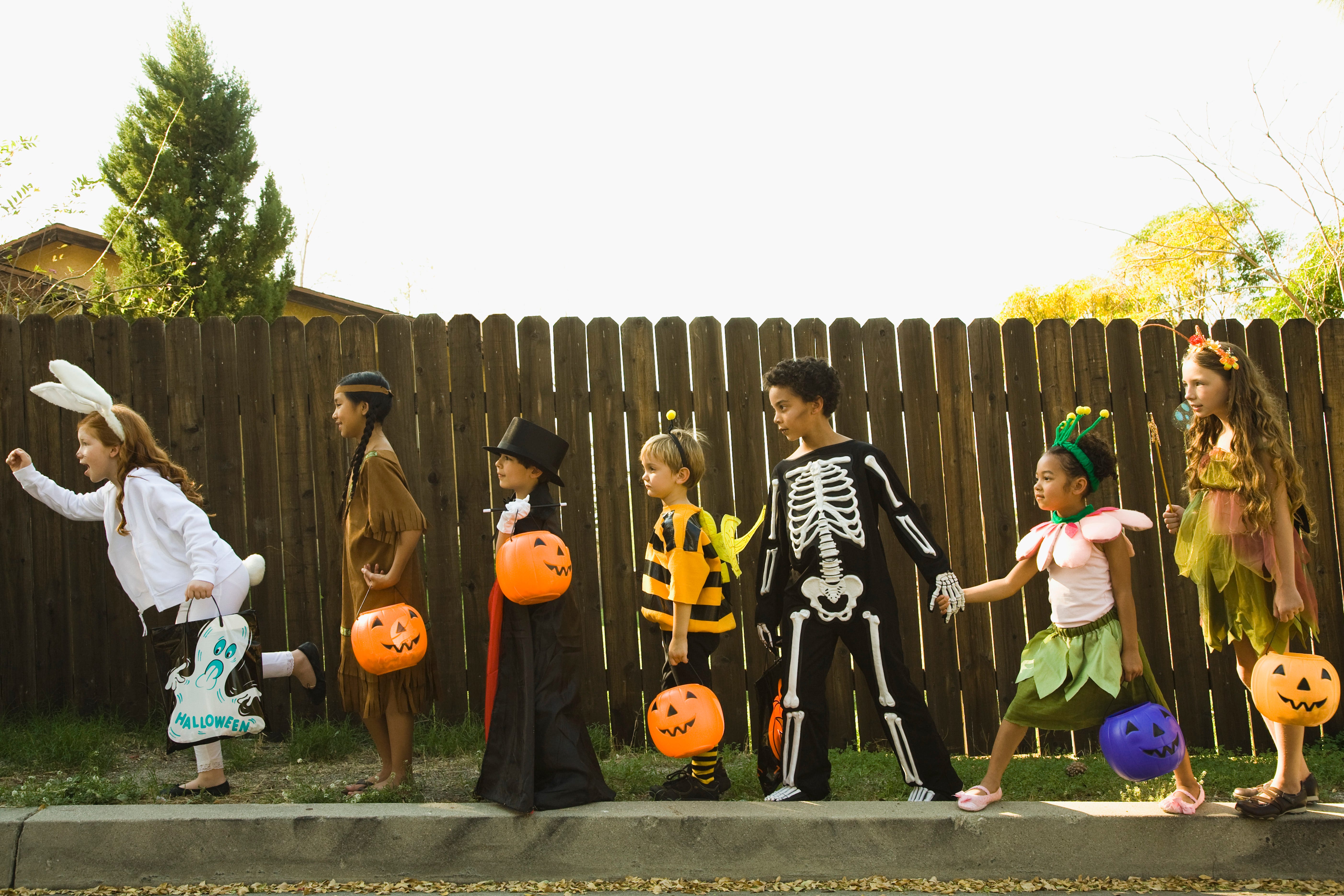 Trick-or-Treating's History and the First Fun Size Candy Bar