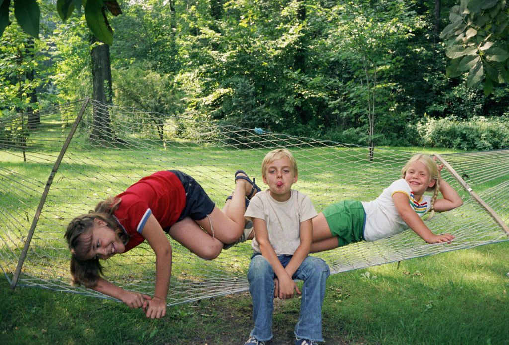 Children playing on hammock