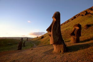 chile, easter island, moai statues of rano raraku at dusk