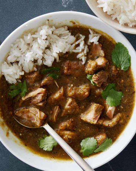 chile verde with white rice in a white bowl