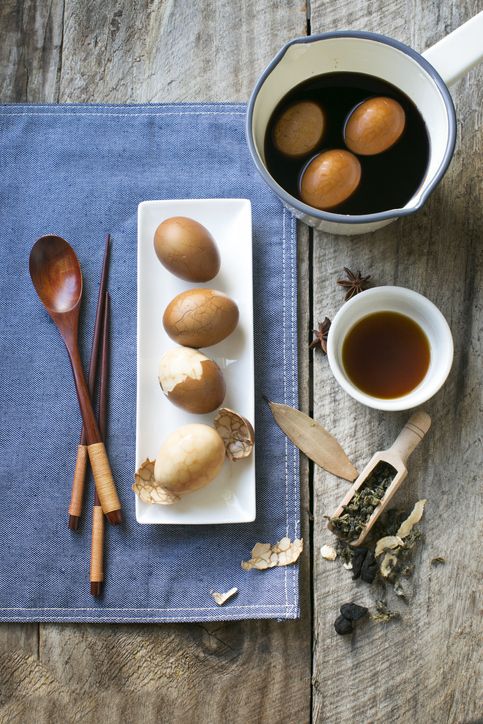 chinese food marble tea egg on rustic wooden counter top