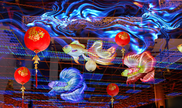 different fishes swim through red lanterns