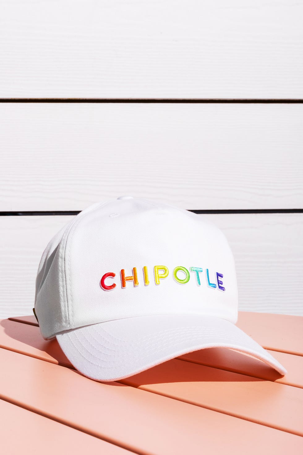 White, Clothing, Cap, Product, Baseball cap, Orange, Text, Trucker hat, Headgear, Logo, 