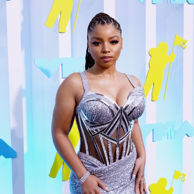 Chloë Wears Silver Gown with Highest Leg Slit at 2022 MTV VMAs