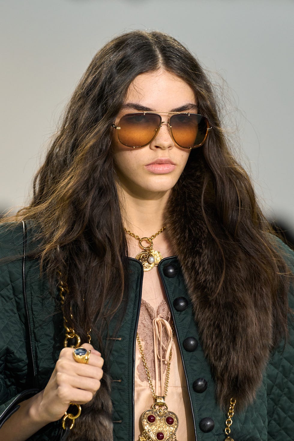 Fashion model showcasing a stylish outfit with accessories Fashion model showcasing a stylish outfit with accessories