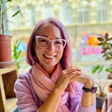 a woman sitting at a table