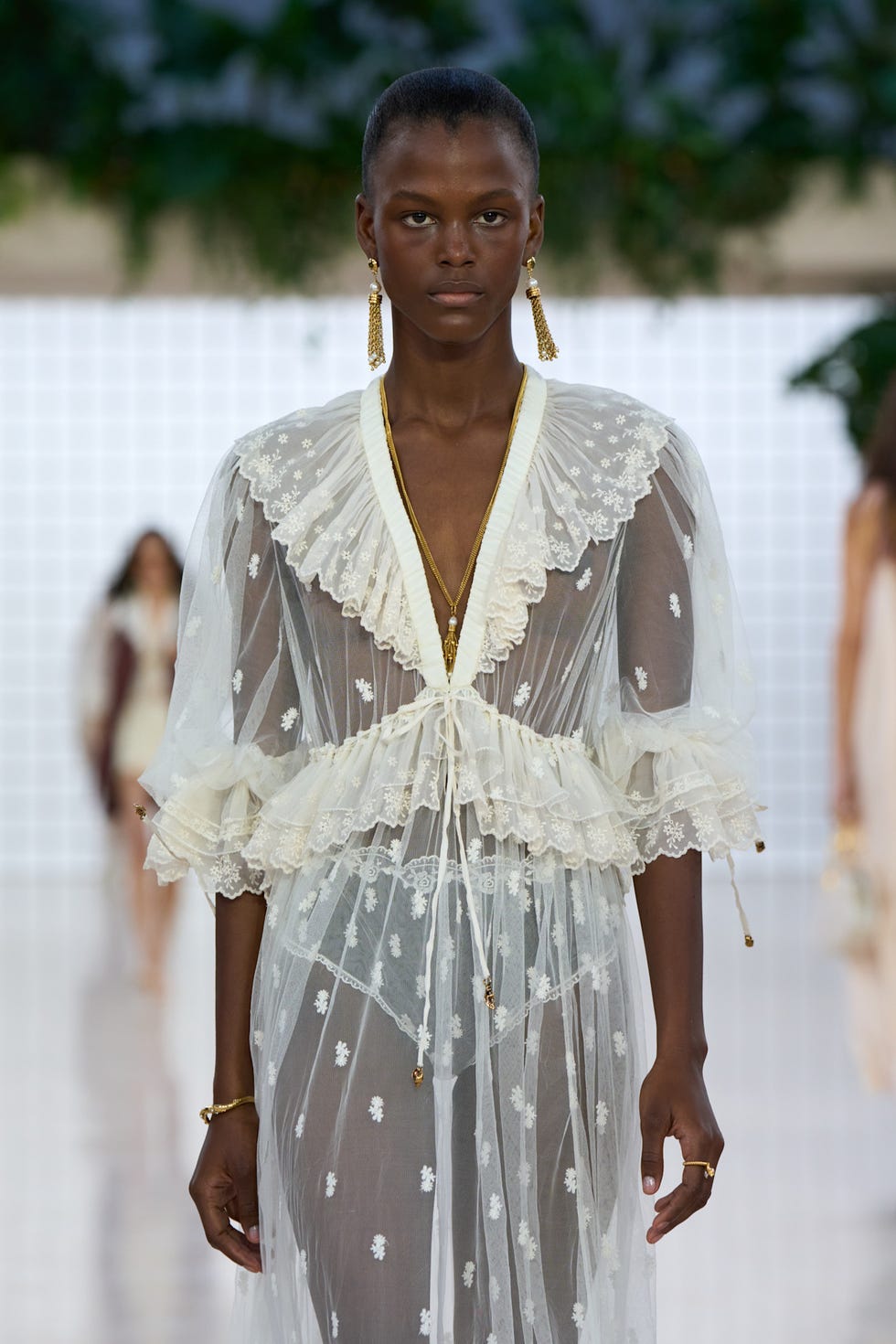 Chloe model SS25 in sheer white dress