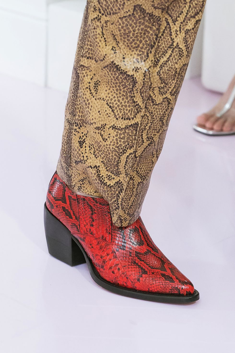 Footwear, Boot, Red, Shoe, High heels, Fashion, Visual arts, Leg, Design, Cowboy boot, 
