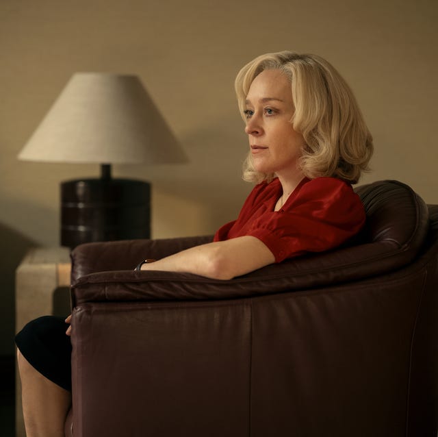 Chloe Sevigny portrays Kitty Menendez in 'Monsters' on Netflix chloe sevigny sitting in a leather chair and looking outward in a scene from a tv show