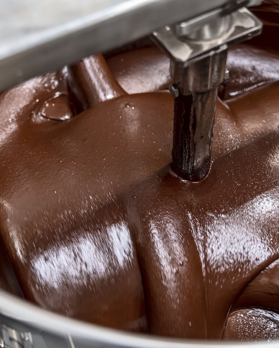 chocolate being mixed in a melanger
