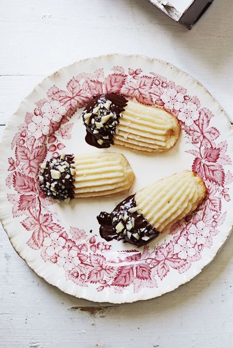 chocolate almond tea cookies on a pink and white plate