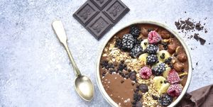 chocolate banana smoothie bowl with frozen berries