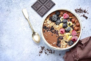 chocolate banana smoothie bowl with frozen berries