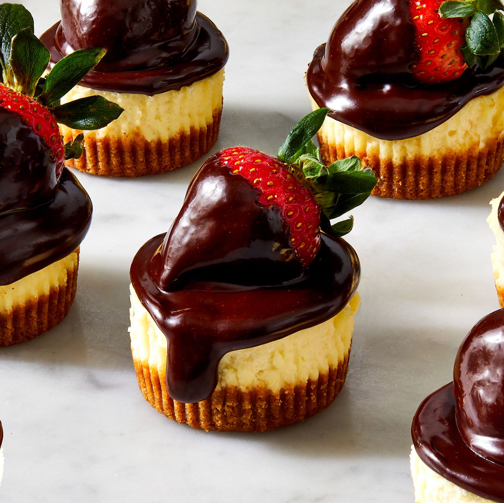 Chocolate-Covered Strawberry Cheesecakes Are The Two-In-One Dessert We're Obsessing Over This Valentine's Day