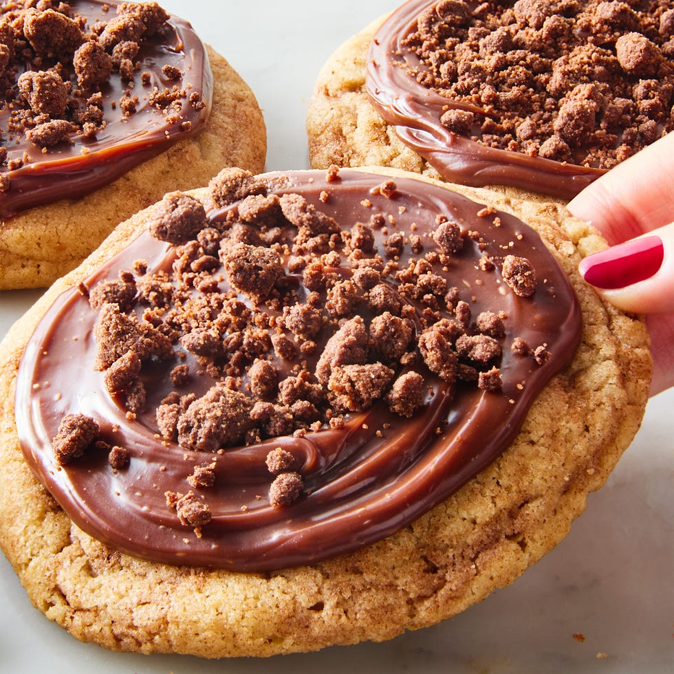 crumbl sugar cookie copycat topped with chocolate icing and chocolate pieces