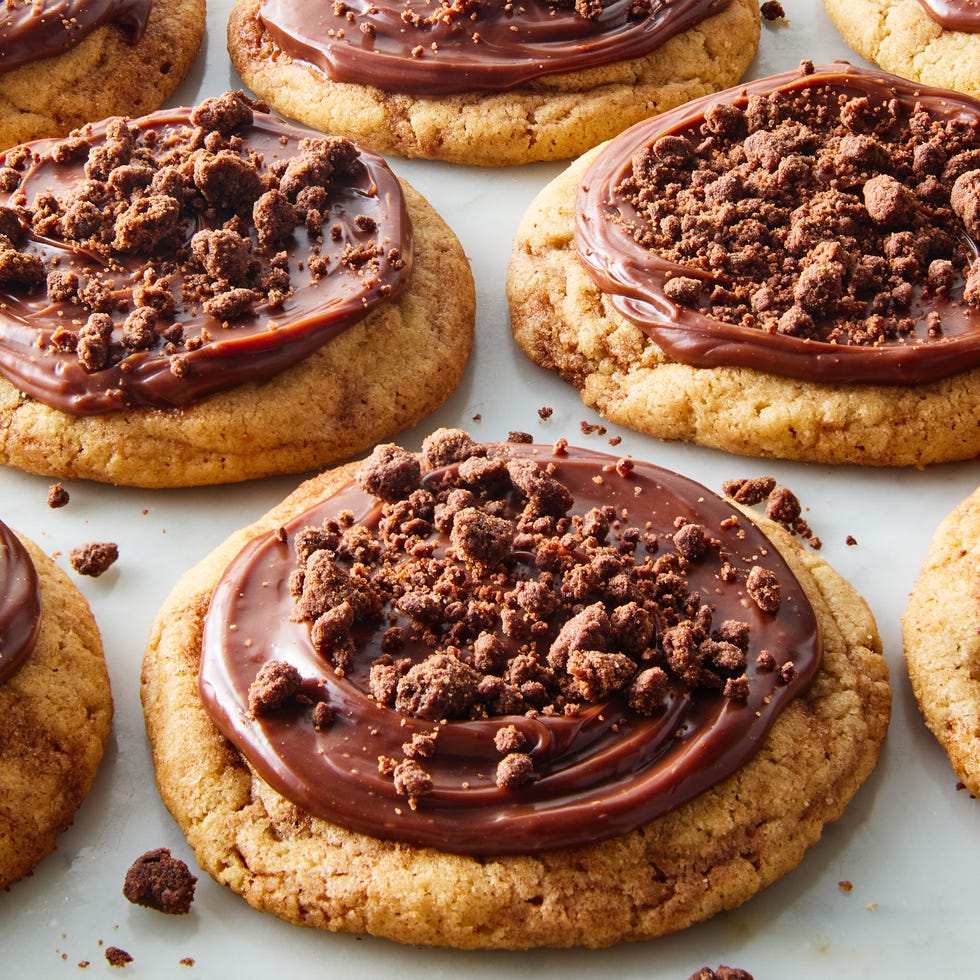 Chocolate Crumb Cake Crumbl Cookie Copycat crumbl sugar cookie copycat topped with chocolate icing and chocolate pieces