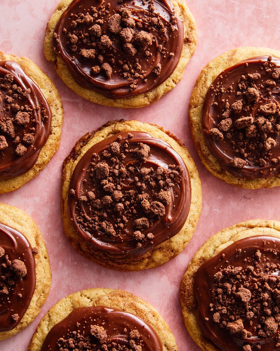 crumbl sugar cookie copycat topped with chocolate icing and chocolate pieces