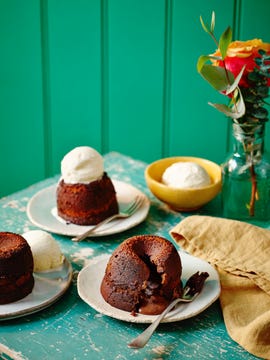 a table with plates of desserts