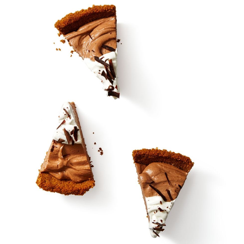 slices of chocolate hazelnut cheesecake on a white table