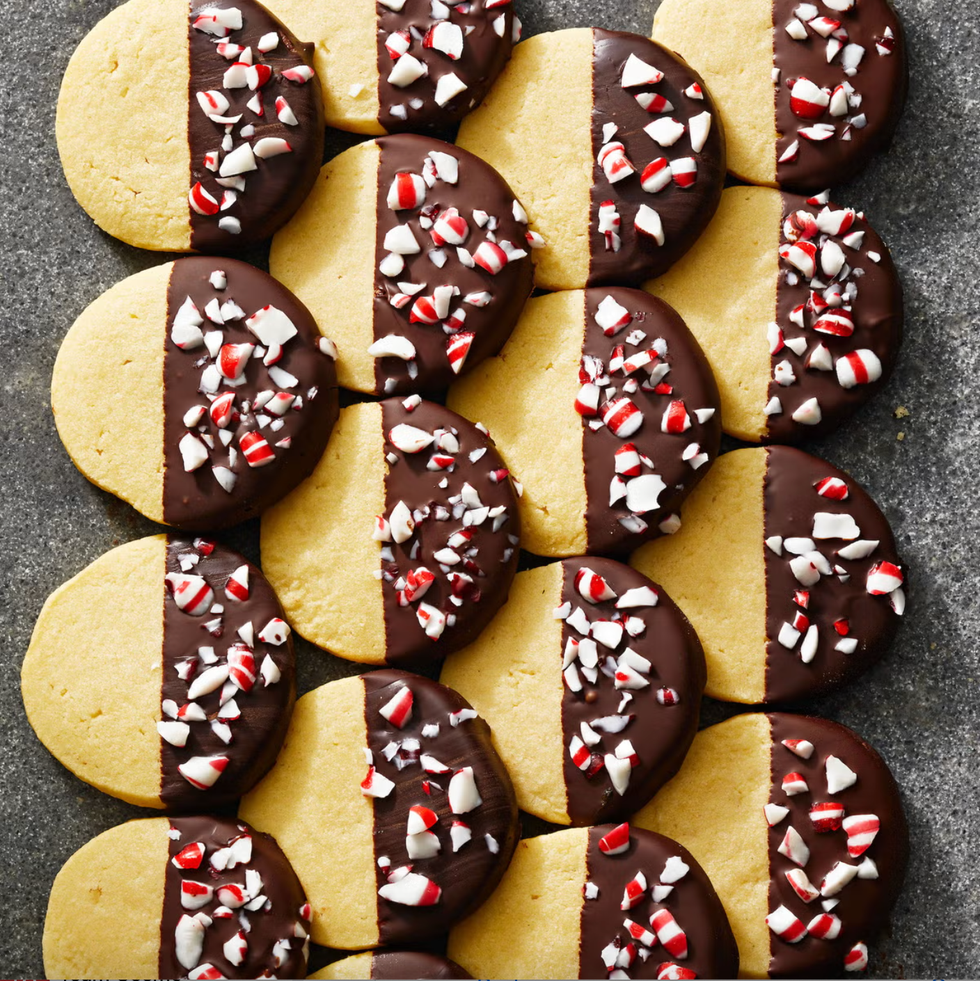 chocolate peppermint cookies with chocolate dip and sprinkle of crushed candy canes