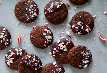 chocolate peppermint cookies half covered in chocolate with crushed peppermint candies