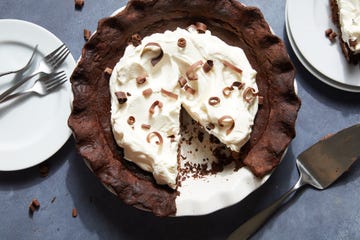 chocolate pie with whipped cream and chocolate shavings