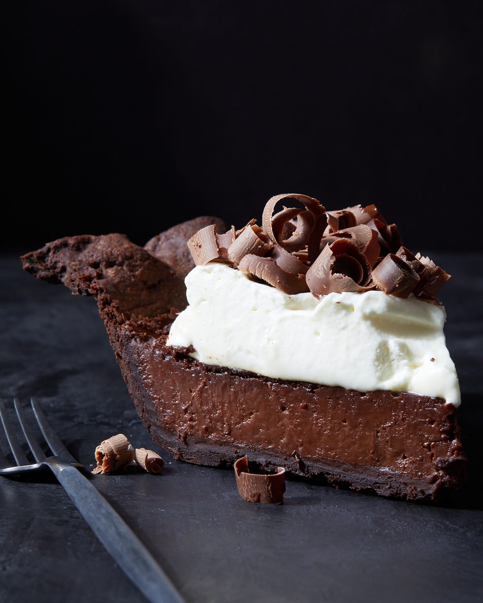 chocolate pie with whipped cream and chocolate shavings