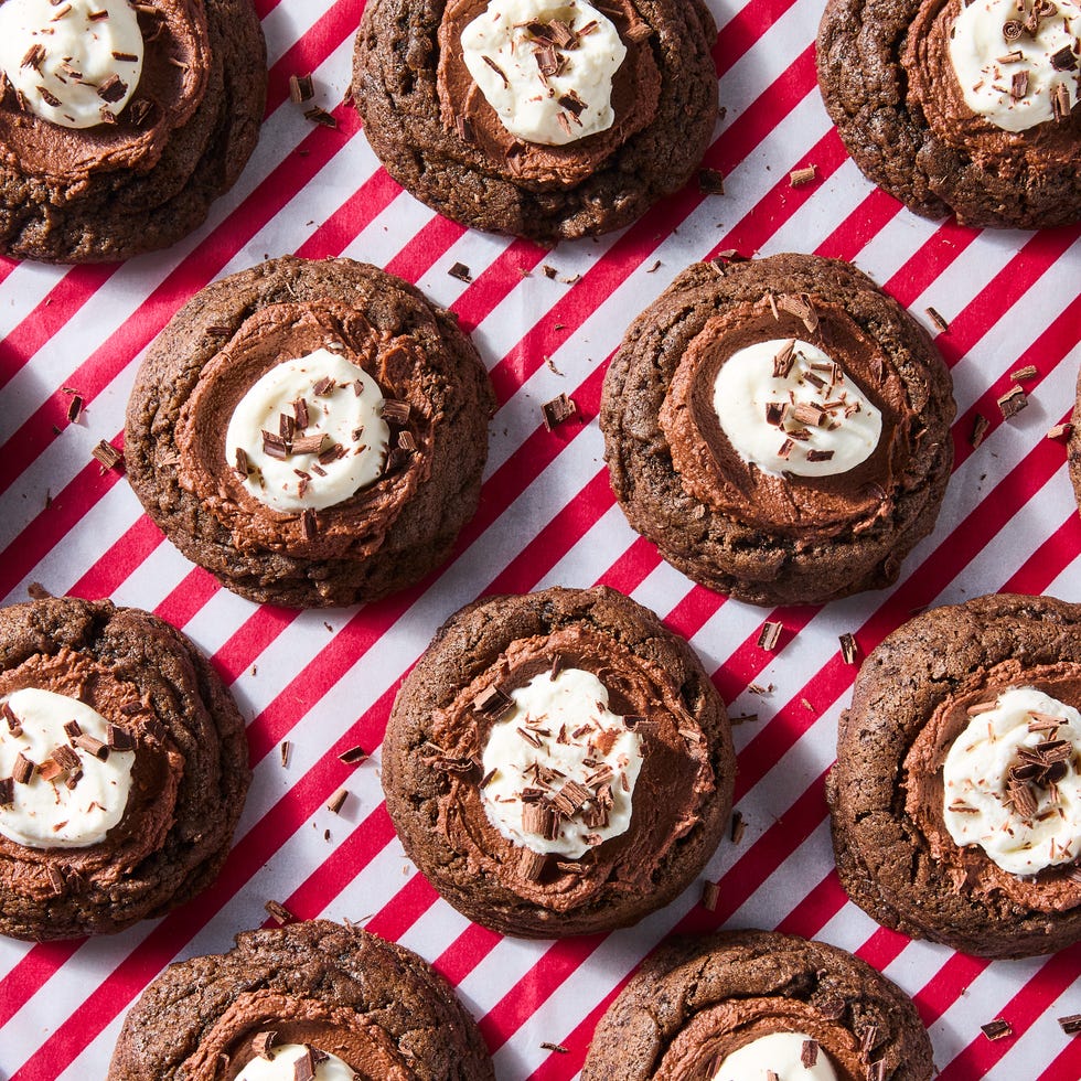 chocolate pie cookies topped with whipped cream and chocolate shavings