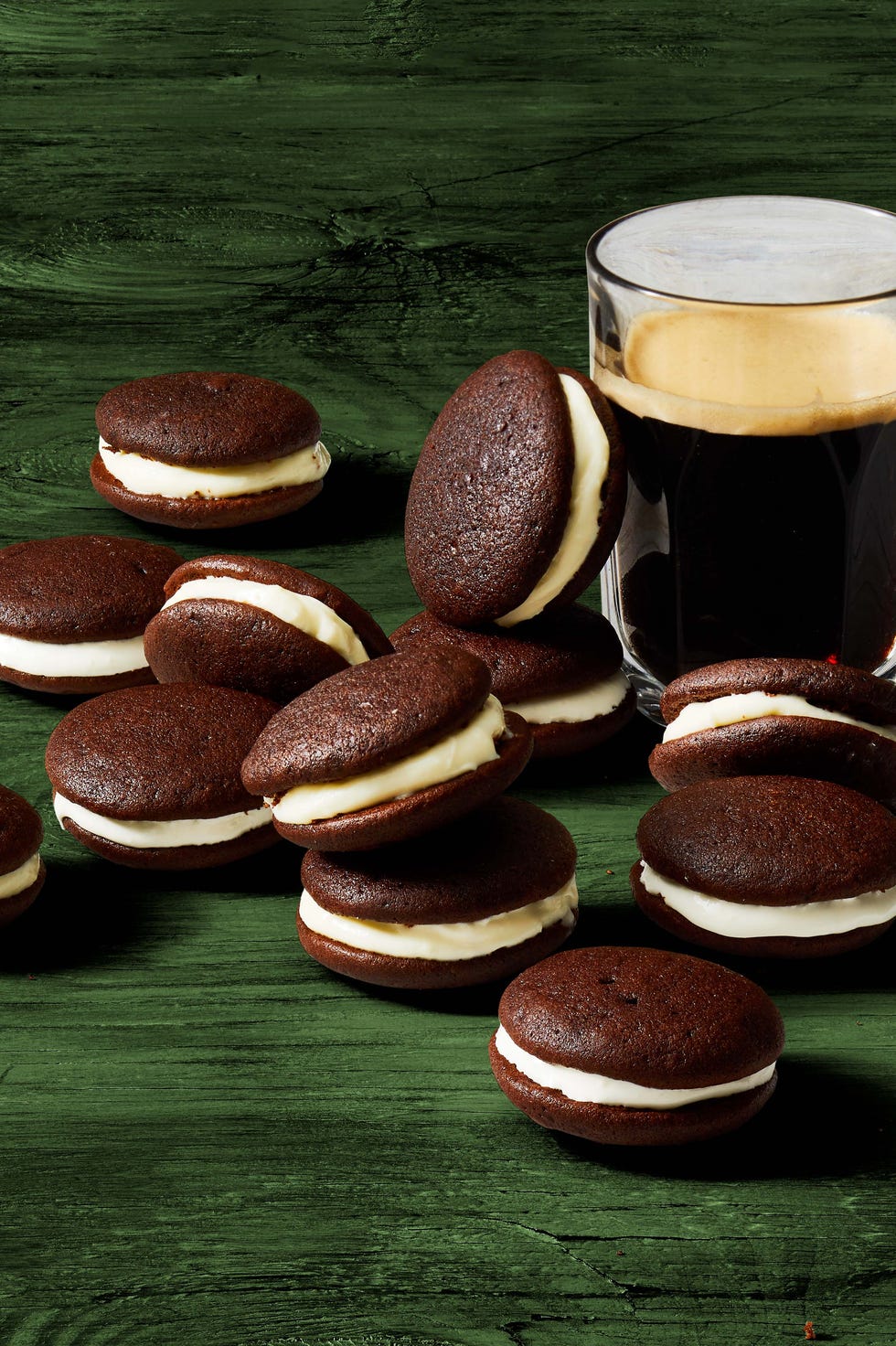 chocolate whoopie pies next to a glass of dark irish beer