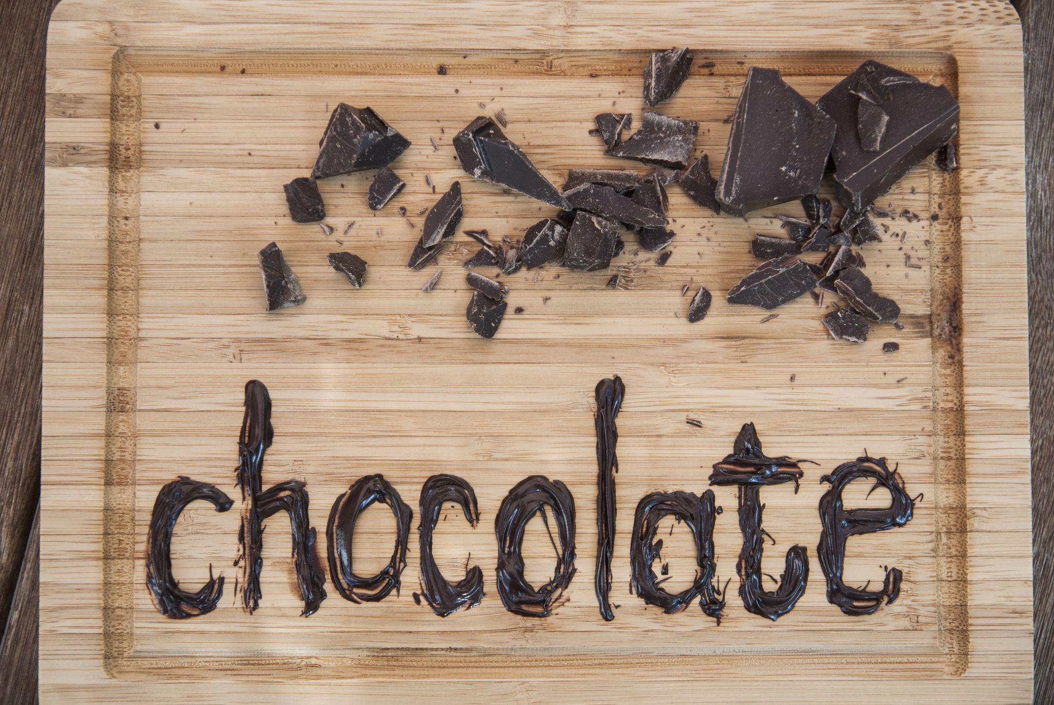 Chocolate written on cutting board