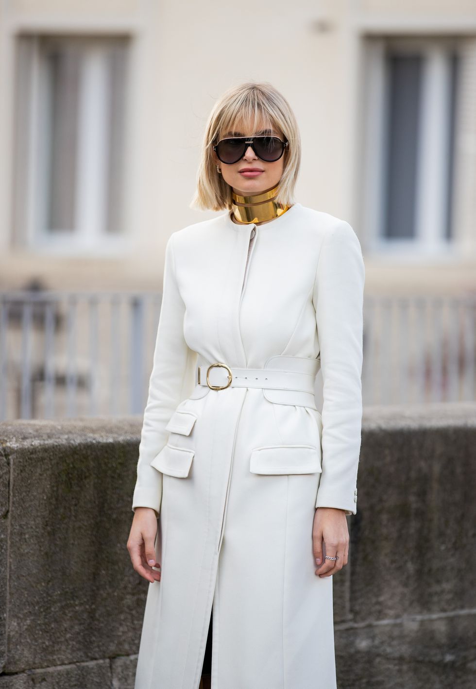 paris, france   february 29 xenia adonts is seen wearing golden necklace choker, white coat, belt outside elie saab during paris fashion week   womenswear fallwinter 20202021  day six on february 29, 2020 in paris, france photo by christian vieriggetty images