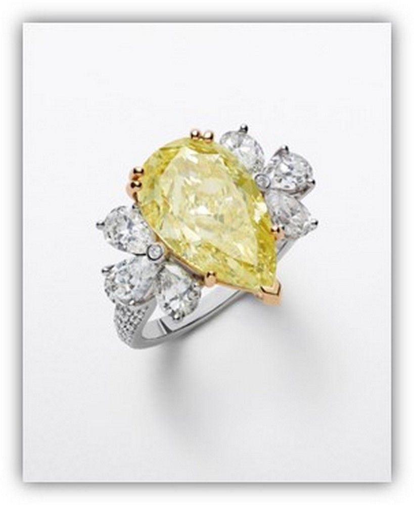 Yellow, Gemstone, Fashion accessory, Diamond, Jewellery, Engagement ring, Ring, Quartz, Platinum, 
