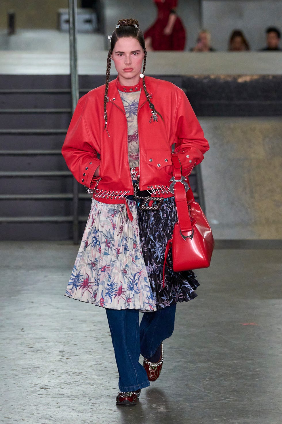 a model showcases a unique outfit featuring bright colors and layered styles