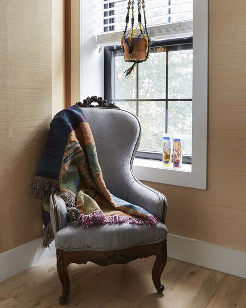 arm chair, orange walls