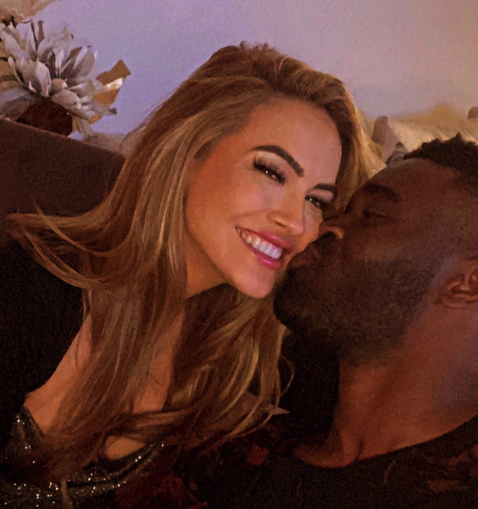 chrishell stause and keo motsepe cuddle up together