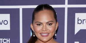 chrissy teigen calls out plastic surgeon for saying she had cheek filler