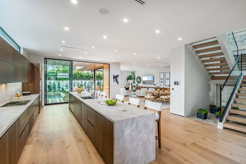 open plan kitchen, living, and dining area