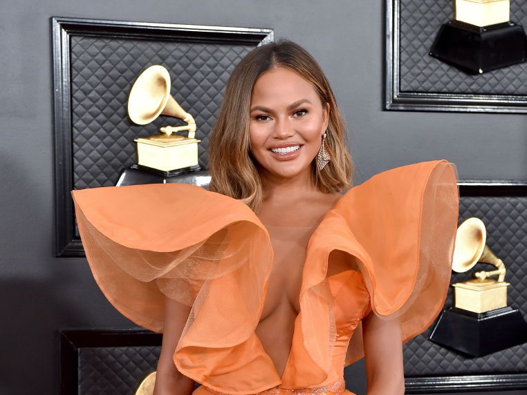 Chrissy Teigen Says Her Breasts Have Ballooned to A 40DD Cup Size