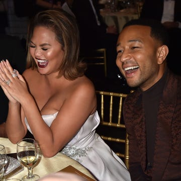 Chrissy Teigen and John Legend laughing at the Critics' Choice Awards Chrissy Teigen and John Legend laughing at the Critics' Choice Awards
