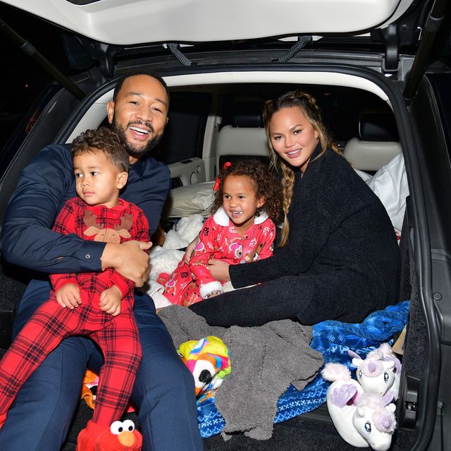 los angeles, california   november 13 editors note this image has been retouched l r miles theodore stephens, john legend, luna simone stephens, and chrissy teigen attend netflixs jingle jangle a christmas journey drive in premiere at the grove on november 13, 2020 in los angeles, california photo by matt winkelmeyergetty images for netflix
