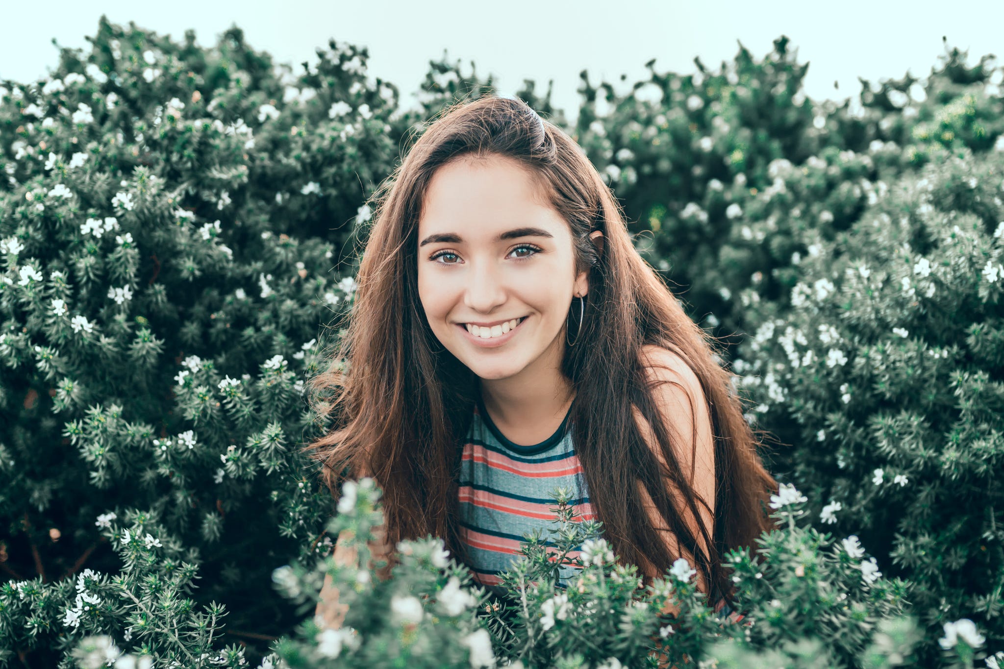 Hair, People in nature, Face, Photograph, Facial expression, Green, Skin, Smile, Beauty, Hairstyle, 